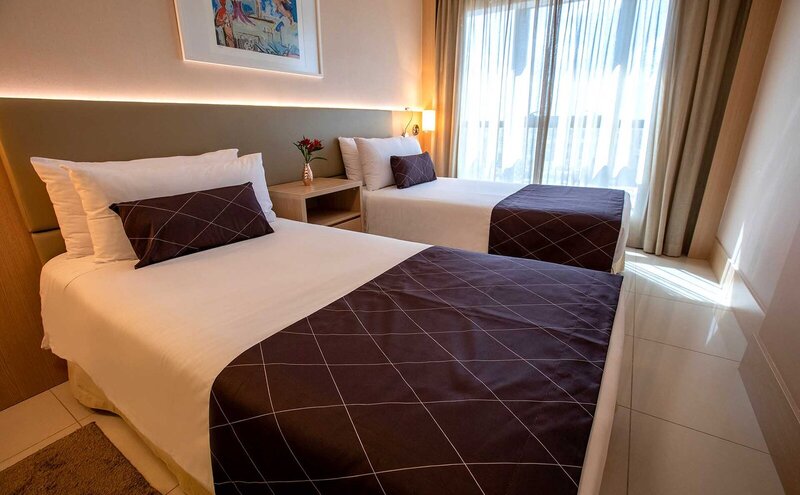 Quarto solteiro com 2 camas de solteiro